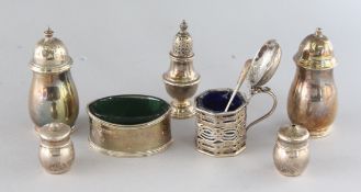 A SILVER SALT AND PEPPER, Birmingham 1941, and a pepperette, oval salt, mustard pot, salt and pepper