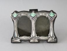 A SMALL SILVER AND ENAMEL DOUBLE FRAME. 3ins x 4.5ins.