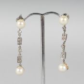 A PAIR OF 18CT WHITE GOLD, DIAMOND AND PEARL DROP EARRINGS.