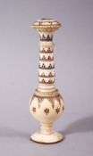 A 19TH CENTURY INDIAN TURNED IVORY NEEDLE CASE, 10.5cm high.