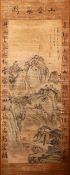 A 20TH CENTURY CHINESE SCROLL PAINTING, a figure standing at the base of a mountainous landscape,