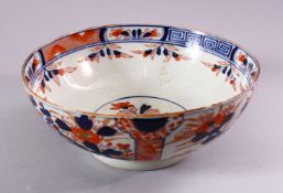 A JAPANESE EDO / MEIJI PERIOD IMARI PORCELAIN BOWL, decorated with panel displays of native flora