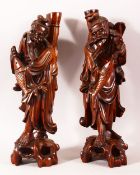 A PAIR OF CHINESE CARVED 'ROOTWOOD' FIGURES of fisherman, 35cm high.