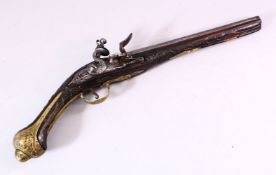 AN 18TH CENTURY ANGLO INDIAN FLINTLOCK PISTOL, with engraved lockplate, carved stock and ornate