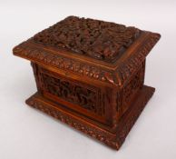 A GOOD 19TH CENTURY CHINESE CANTON CARVED WOODEN CASKET, the top carved with typical canton scenes
