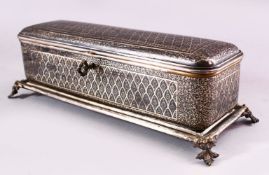 A BIDRI SILVER INLAID RECTANGULAR HINGED CASKET for the European market, with panels of scrolling