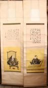 A NEAR PAIR OF CHINESE SCROLL PAINTINGS, each with a panel with seated figures beneath calligraphy