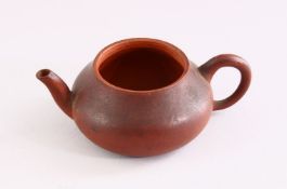A MINIATURE YIXING TEAPOT, 9cm wide.