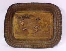 AN EARLY 20TH CENTURY JAPANESE MIXED METAL TRAY, etched with a landscape and temples with figural