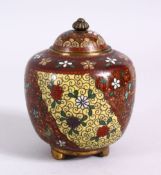 A 19TH CENTURY JAPANESE CLOISONNE POT & COVER, with gold speck decoration with flora upon multi