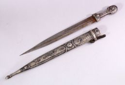 A 19TH CENTURY RUSSIAN KINJAL DAGGER with niello decoration to the scabbard and hilt, 53cm long.