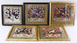 A GROUP OF FIVE CHINESE EMBROIDERED RANK BADGES, framed and glazed, 40cm x 42cm.