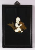 A 20TH CENTURY CHINESE SCHOOL REVERSE PAINTING ON GLASS, of a young boy and carp, 60cm x 46cm.