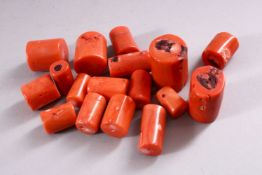 A QUANTITY OF CORAL BEADS, largest 3.5cm.