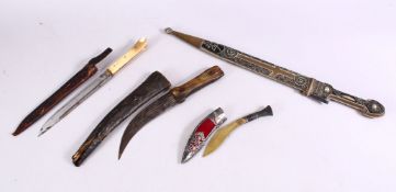 A 20TH CENTURY RUSSIAN KINJAL DAGGER with filigree decoration and three other knives.