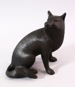 A 20TH CENTURY JAPANESE CAST BRONZE MODEL OF A SEATED FOX, with finely engraved detail and signed,