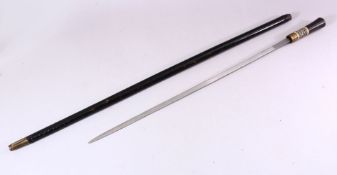 AN INDIAN EBONY, BONE AND HORN MOUNTED SWORD STICK, 91cm long.