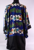 A GOOD CHINESE 19TH / 20TH CENTURY PAINTED SILK ROBE, the black ground robe with painted decorated
