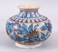 AN GOOD TURKISH POTTERY GLOBULAR VASE, decorated with formal floral decoration, 12cm high.