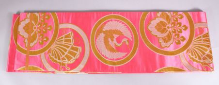 A FINE JAPANESE SILK EMBROIDERED FUKURO OBI TIE - upon a pink ground with silver and gold coloured