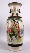 A LARGE CHINESE 19TH / 20TH CENTURY FAMILLE ROSE CRACKLEWARE PORCELAIN VASE, decorated with scenes