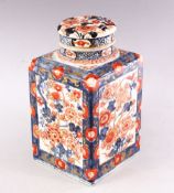 A 19TH CENTURY JAPANESE IMARI SQUARE SHAPED TEA CADDY AND COVER, painted with panels of