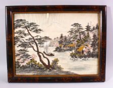 A CHINESE NEEDLEWORK PICTURE, river scene with a junk and buildings, framed and glazed, image 28cm x