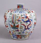 A CHINESE MING STYLE JIAJING STYLE WUCAI PORCELAIN VASE, decorated in wucai palate depicting
