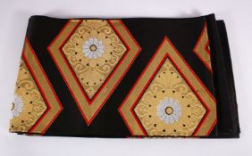 A FINE JAPANESE SILK EMBROIDERED FUKURO OBI TIE - upon a black ground with silver and gold