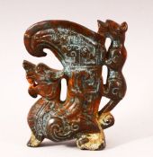 A 20TH CENTURY CHINESE ARCHAIC STYLE CARVED HARDSTONE EWER, the body carved as a dragon, the