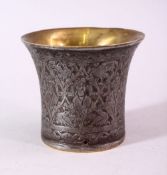 A SMALL BRASS AND ENGRAVED STEEL BEAKER SHAPED VESSEL, the exterior engraved with figures, 7.5cm
