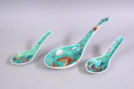 A CHINESE PORCELAIN SPOON, with turquoise ground and two similar.