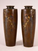 A GOOD SMALL PAIR OF MID 20TH CENTURY JAPANESE MIXED METAL VASES, each depicting a cockerel seated