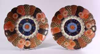 A PAIR OF JAPANESE MEIJI PERIOD IMARI PORCELAIN CHRYSANTHEMUM FORMED PLATES, each decorated with