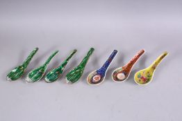 A SET OF FOUR CHINESE PORCELAIN SPOONS, and three other similar.