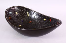 AN UNSUAL ISRAEL POTTERY BOWL, with carved decoration, the base marked israel lapid, 30cm x 18cm