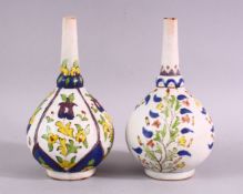TWO ISLAMIC FLORAL DECORATED ROSEWATER SPRINKLERS, 15cm high.
