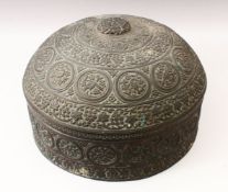 A 19TH CENTURY INDIAN EMBOSSED COPPER BOWL AND COVER, the vessel with embossed decoration with