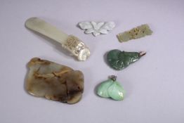 SIX JADE AND JADITE PENDANTS, and other pieces.