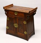 AN EARLY 20TH CENTURY CHINESE ALTER STYLE CABINET with scroll ends, a single small drawer over a