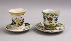 TWO KUTAHYA POTTERY CUPS & SAUCERS (4), each decorated with floral decoration, largest cup: 8.5cm
