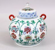 A SMALL CHINESE DOUCAI PORCELAIN JAR AND COVER, the body of the jar decorated with formal