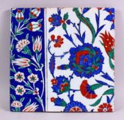 A GOOD LARGE IZNIK TILE, with classic style floral decoration, 28cm x 28cm.