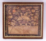 A CHINESE GOLD THREAD EMBROIDERED RANK BADGE, depicting a bird, 31cm x 33cm.