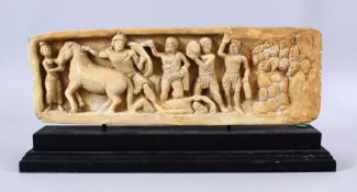 A CARVED ISLAMIC / TURKISH STONE FIGURAL PANEL , carved in deep relief to depict figures and a