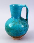 A GOOD EARLY TURQUOISE GLAZED POTTERY EWER, 20cm high.
