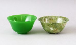 A SMALL PEKING GLASS BOWL and a similar bowenite bowl, both 10cm diameter.