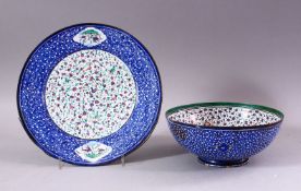 A 19TH CENTURY PERISAN ENAMEL BOWL AND DISH, the bowl with a white interior with bird and flora