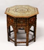 A GOOD LATE 19TH / EARLY 20TH CENTURY ISLAMIC BONE INLAID OCTAGONAL TABLE, profusely inlaid with