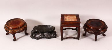 A CHINESE MINIATURE MARBLE TOP HARDWOOD STAND, 14cm high, a pair of circular stands and another